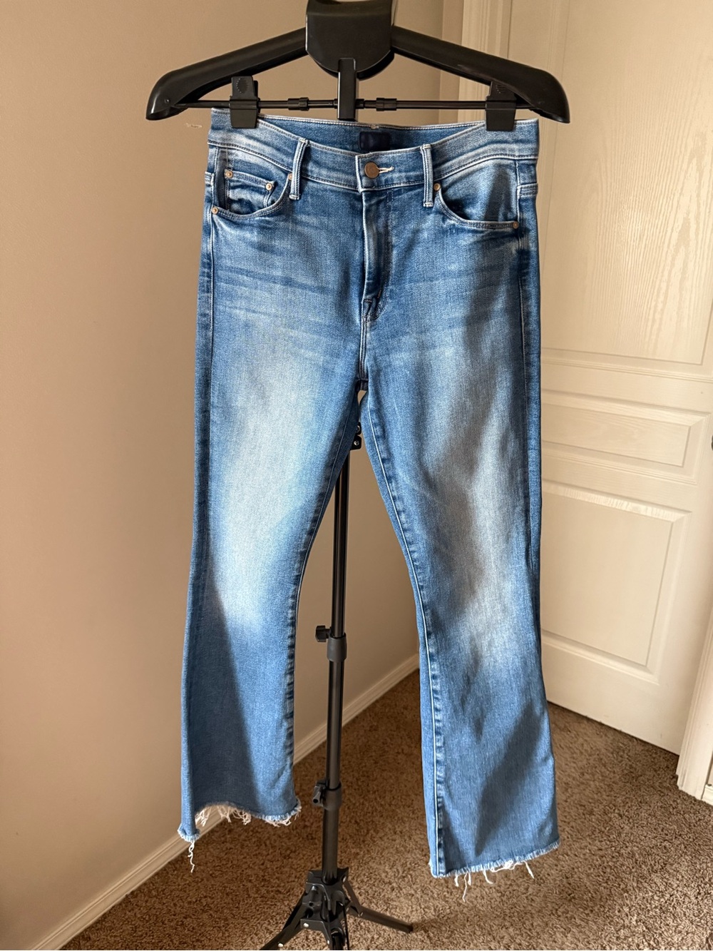 MOTHER Light Blue Flared Jeans with Frayed Hem